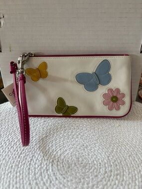 Coach White Leather Wristlet with Pink Trim and Multicolor Butterfly Appliqués